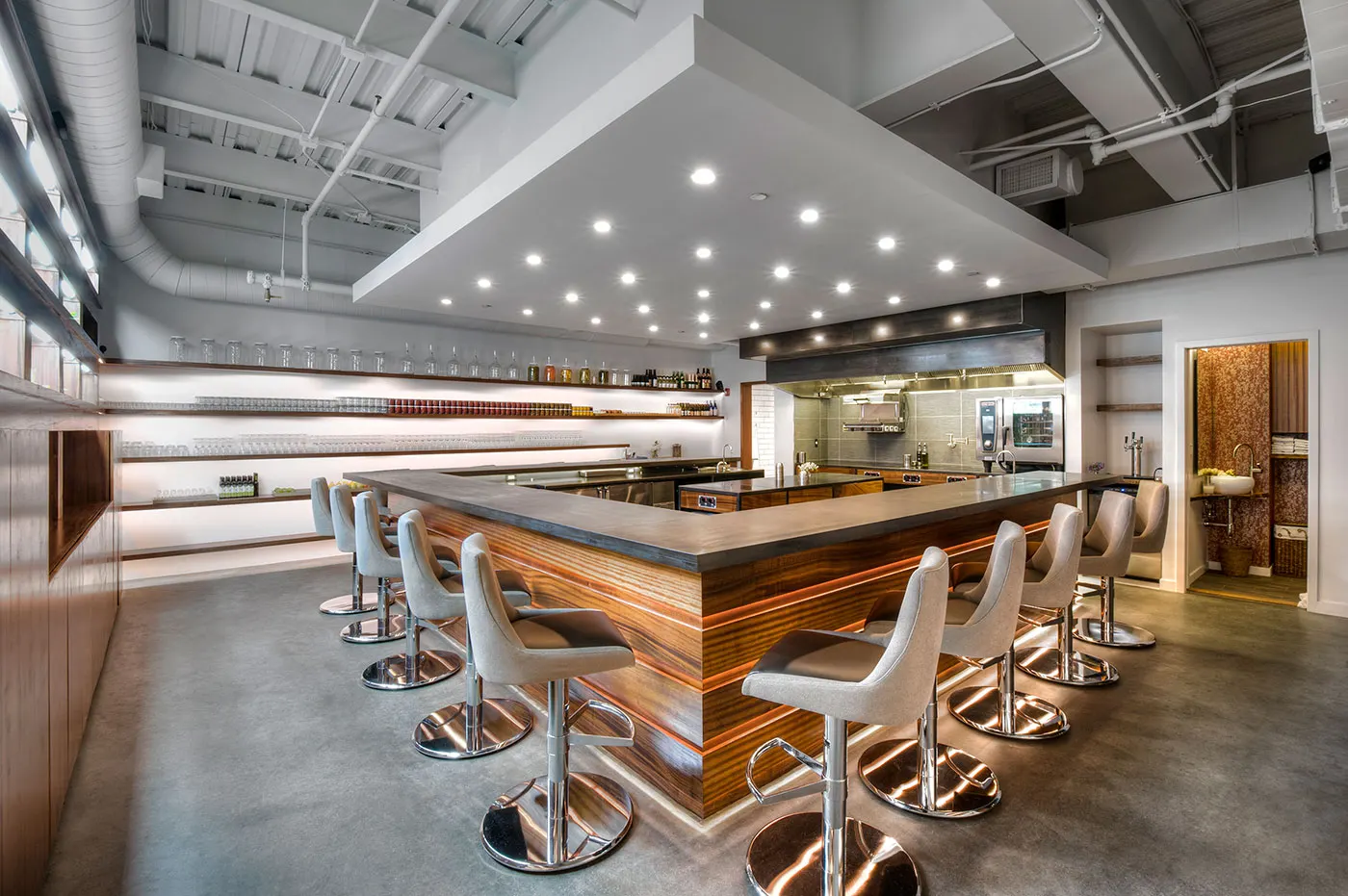The counter at Tasting Counter, seats facing the open kitchen
