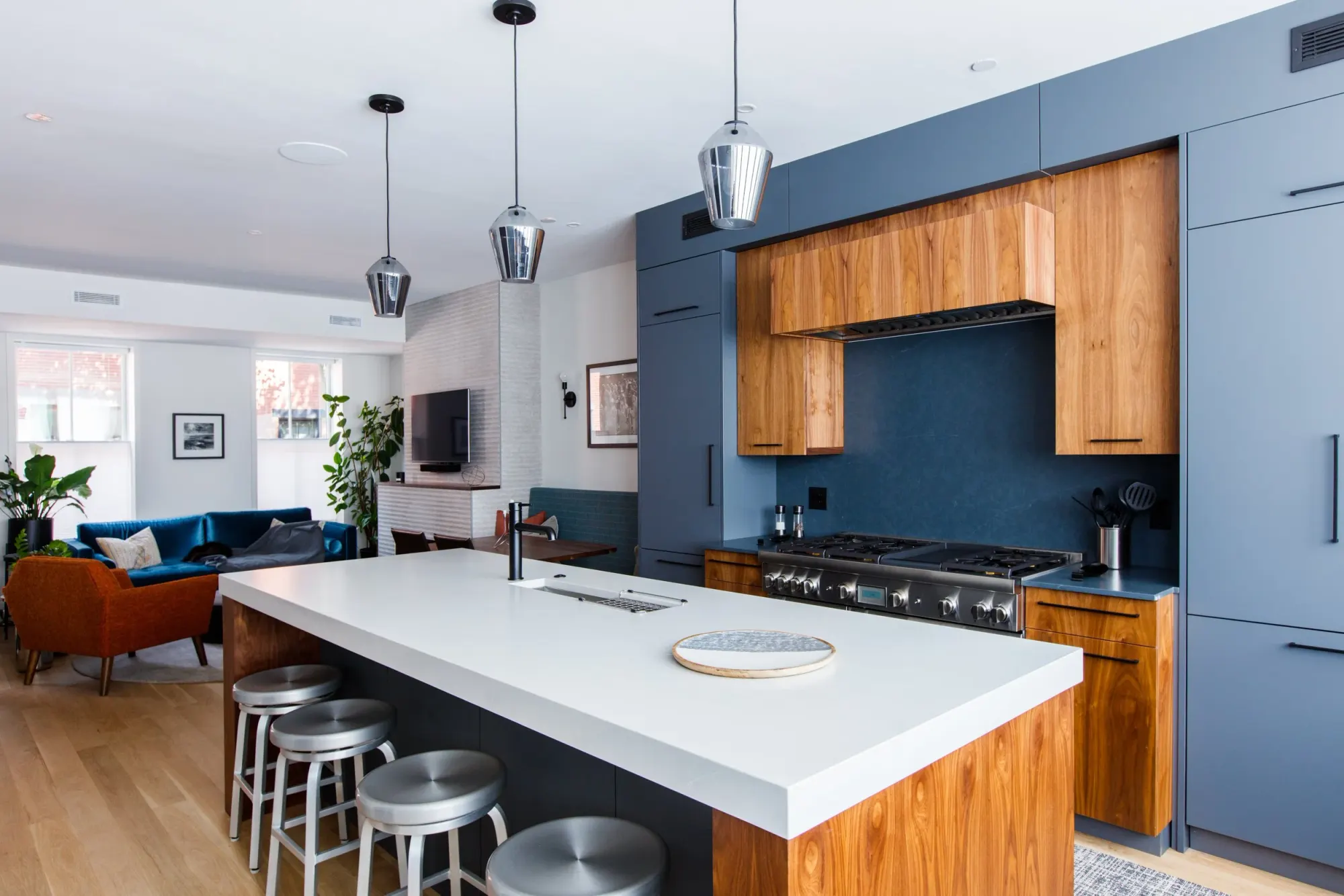 The kitchen at Bradford Street, a walnut island under three pendants